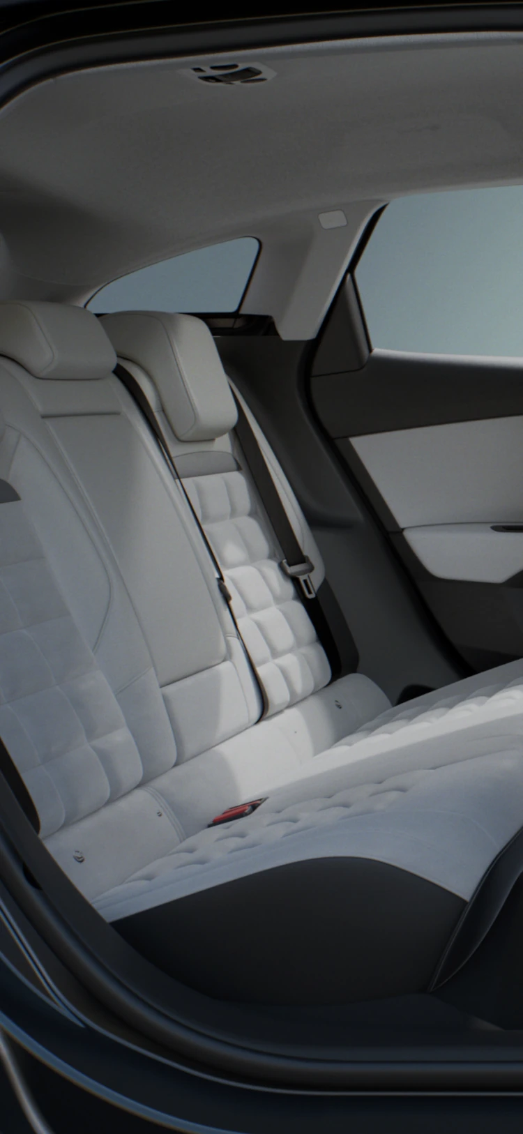 Vue intérieure large de la Citroën ë-C4 X montrant les sièges avant et arrière dans un habitacle lumineux et spacieux